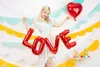 Folienballon Love 140x35cm rot Produktbild-Vorschau 6