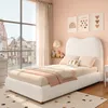 A bedroom setting with a bed, window, and wall art. Anteprima dell’immagine prodotto
