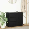 A black sideboard with drawers and a cabinet door is shown in a room with a plant and a coat rack. Produktbild-Vorschau