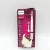 The image shows the side of a product box for a Philips personal grooming device. The box features product illustrations, feature descriptions, and brand information. Náhled obrázku produktu