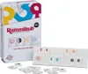 A Rummikub Twist Mini Tin board game box and some of its tiles are displayed on a white background. Produktbild-Vorschau