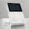 A white DoorBird IP Video Indoor Station is displayed on a light gray background. Produktbild-Vorschau