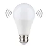 A white LED light bulb with a silver base, shown against a white background. There are graphic representations of sound waves emanating from the sides of the bulb. Produktbild-Vorschau