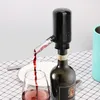 A wine dispenser is shown pouring red wine from a bottle into a glass. Anteprima dell’immagine prodotto