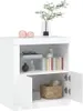 A white sideboard with its doors open, displaying shelves with books, a basket, and decorative items. Voir les images du produit