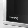 A close-up of a microwave door with the H.Koenig logo visible. Produktbild-Vorschau
