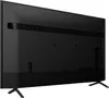 The back of a black Sony television set with its stand. Produktbild-Vorschau