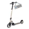 A white scooter with a tag attached to the handlebars. Produktbild-Vorschau