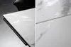 A split image showing two close-up views of a white marble-patterned tabletop. Produktbild-Vorschau