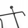 Close-up of a black metal garden fence element. Podgląd zdjęcia produktu