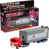 A Transformers toy, Optimus Prime, in its packaging and also displayed outside of the packaging. Produktbild-Vorschau