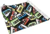A roll of self-adhesive furniture film with a pattern of colorful cassette tapes. Náhled obrázku produktu