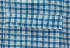 A close-up view of a blue and white checkered fabric with a folded pocket. Produktbild-Vorschau