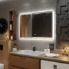 A modern bathroom with a sink, mirror, and washing machine. Produktbild-Vorschau