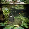 An underwater view of a pond with a water pump and fish. Anteprima dell’immagine prodotto