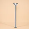 A silver bollard light is shown standing upright against a plain, light peach background. Produktbild-Vorschau