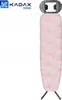 A pink ironing board with a geometric pattern and a black ironing board holder is shown against a white background. Produktbild-Vorschau