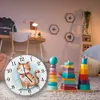 A child's room with a clock and stacking toys. Produktbild-Vorschau