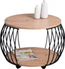 A round coffee table with a wooden top and a black metal cage-like base, featuring two decorative vases on top and a magazine on the lower shelf. Produktbild-Vorschau