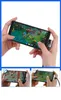 Two hands holding a smartphone while playing a game, with a USB-C cable attached. Podgląd zdjęcia produktu