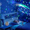 A young girl sleeping in bed with a star projector light illuminating the room. Produktbild-Vorschau