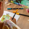 A child is coloring a picture of a turtle with markers. Produktbild-Vorschau