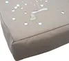 A close-up of a beige fabric surface with water droplets on it. Produktbild-Vorschau