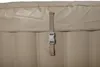 A close-up view of a tan inflatable hot tub cover with a tan strap and gray buckle. Produktbild-Vorschau