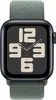 A close-up, front-facing view of an Apple Watch with a green band and a dark watch face displaying large, light-colored numbers. Voir les images du produit