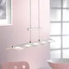 A modern LED pendant light hangs in front of a pink wall, with a hint of a window and a framed picture in the background. Produktbild-Vorschau