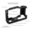 A black camera cage rig with labels pointing out its various threaded holes and mounting points. Náhled obrázku produktu