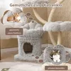 A cat tree with multiple levels and lounging areas, featuring two cats in illustrative thought bubbles. Podgląd zdjęcia produktu