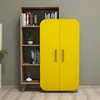 A yellow cabinet next to a wooden bookshelf in a room. Náhled obrázku produktu