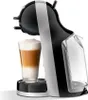 A close-up studio shot of a black and silver coffee machine with a latte in a glass next to it. Anteprima dell’immagine prodotto