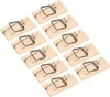 A collection of wooden mouse traps arranged diagonally on a white background. Anteprima dell’immagine prodotto