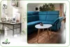 A split image showing a home office setup on the left and a living room with a sofa and coffee table on the right. Produktbild-Vorschau