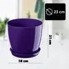 A purple plastic plant pot with a saucer, shown on a light gray and white background with measurement overlays. Produktbild-Vorschau