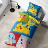 A child's bed with Pokemon-themed bedding, including a duvet cover and pillowcase, displayed in a bedroom setting. Produktbild-Vorschau