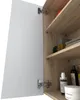 A close-up view of an open bathroom cabinet, showing shelves with rolled towels and bottles. Voir les images du produit