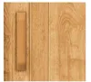 A close-up view of a wooden door with a handle. Produktbild-Vorschau