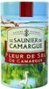 A cylindrical container of Le Saunier de Camargue Fleur de Sel, featuring a scenic illustration of a marshland with flamingos and a heron. Produktbild-Vorschau