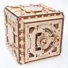 A 3D wooden puzzle shaped like a safe, shown against a white background. Produktbild-Vorschau