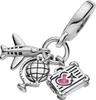 A silver charm with multiple travel-themed elements. Podgląd zdjęcia produktu