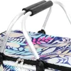A close-up view of the handles and top portion of a picnic basket with a floral pattern. Náhled obrázku produktu