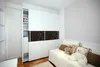 A bedroom with a daybed and a large wardrobe. Náhled obrázku produktu