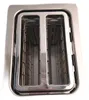 A close-up, top-down view of the interior slots of a stainless steel toaster. Podgląd zdjęcia produktu