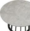 A close-up view of the top of a round coffee table with a concrete-look surface and a black metal base. Podgląd zdjęcia produktu