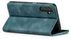 A teal flip case for a smartphone is shown in a side profile, standing upright. Produktbild-Vorschau