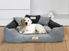 A golden retriever puppy lies in a dog bed with pillows. Voir les images du produit