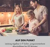 A family cooking together in a kitchen. Produktbild-Vorschau